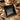 Sierra Ember Discovery Bag flat pouch with back label, coffee beans, almonds, dark chocolate, and warm sunlight.