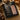 Close-up of Sierra Ember Discovery Bag back label with roasted coffee beans, almonds, dark chocolate, and warm medium roast accents.