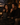 Couple enjoying Stephen James Cacao Nocturne dark roast coffee with dark chocolate on a terrace at dusk