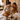 Couple enjoying Stephen James coffee in bed with French press and two coffee cups