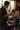 Couple sharing Stephen James Doble Oscuro espresso roast coffee in an urban kitchen at sunrise with city skyline view