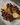 Serena Claro decaf tasting notes with soft caramel drizzle, toasted almonds, and bright lemon citrus on grey marble
