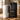 White 16oz #fueledbyCOFFEE tumbler beside a Stephen James Sierra Ember Medium Roast coffee bag on a warm wood surface with scattered coffee beans.
