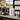 Stephen James 50-count Zambia Light Roast bulk bags styled at an elevated office or hospitality coffee station